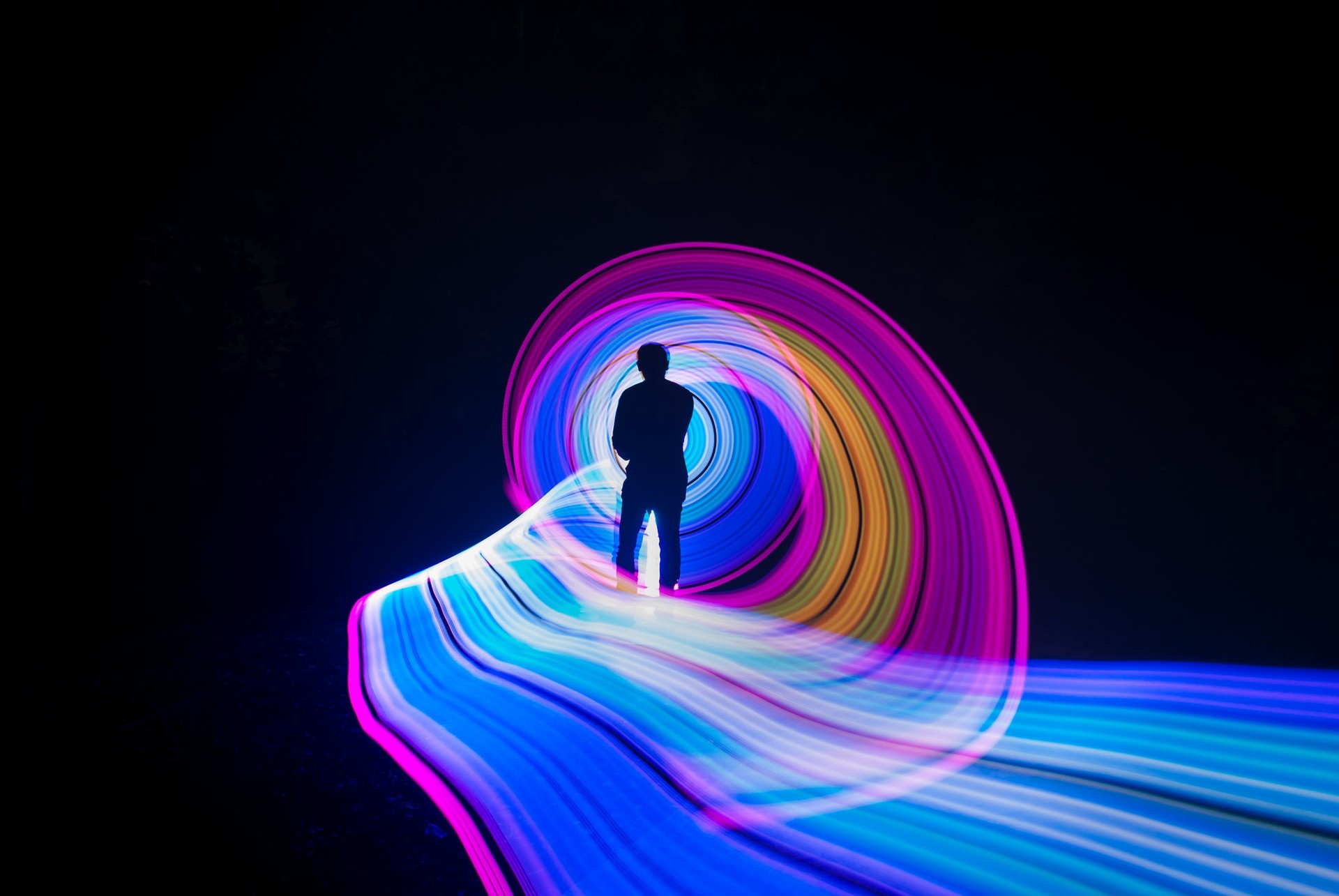 People with beautiful light painting artwork