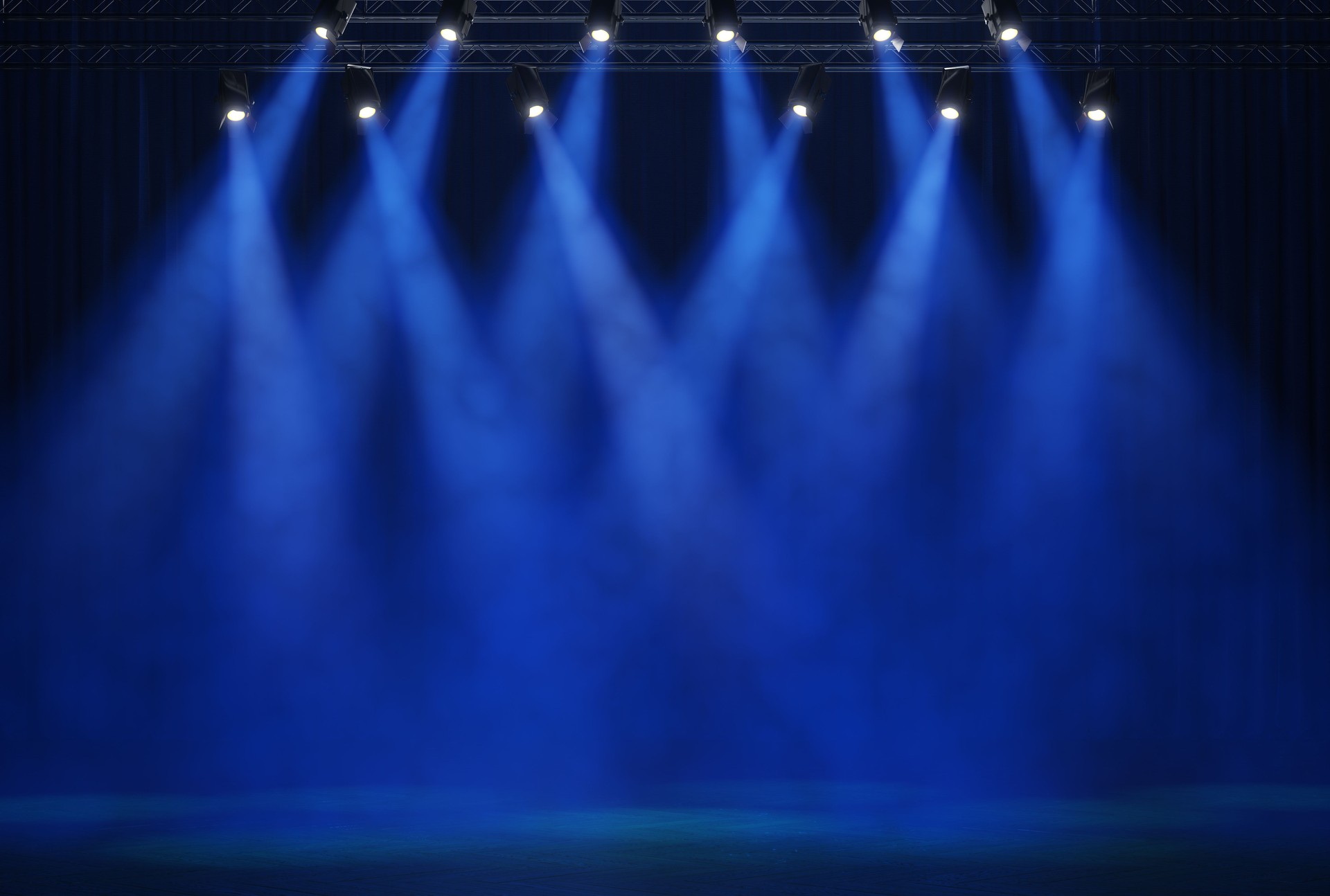 Stage light with colored spotlights and smoke
